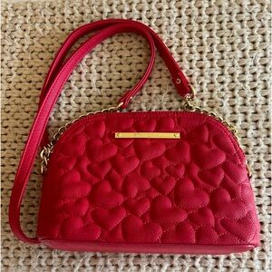 Betsy Johnson Red quilted crossbody bag with hearts on it/gold hardwarel EUC